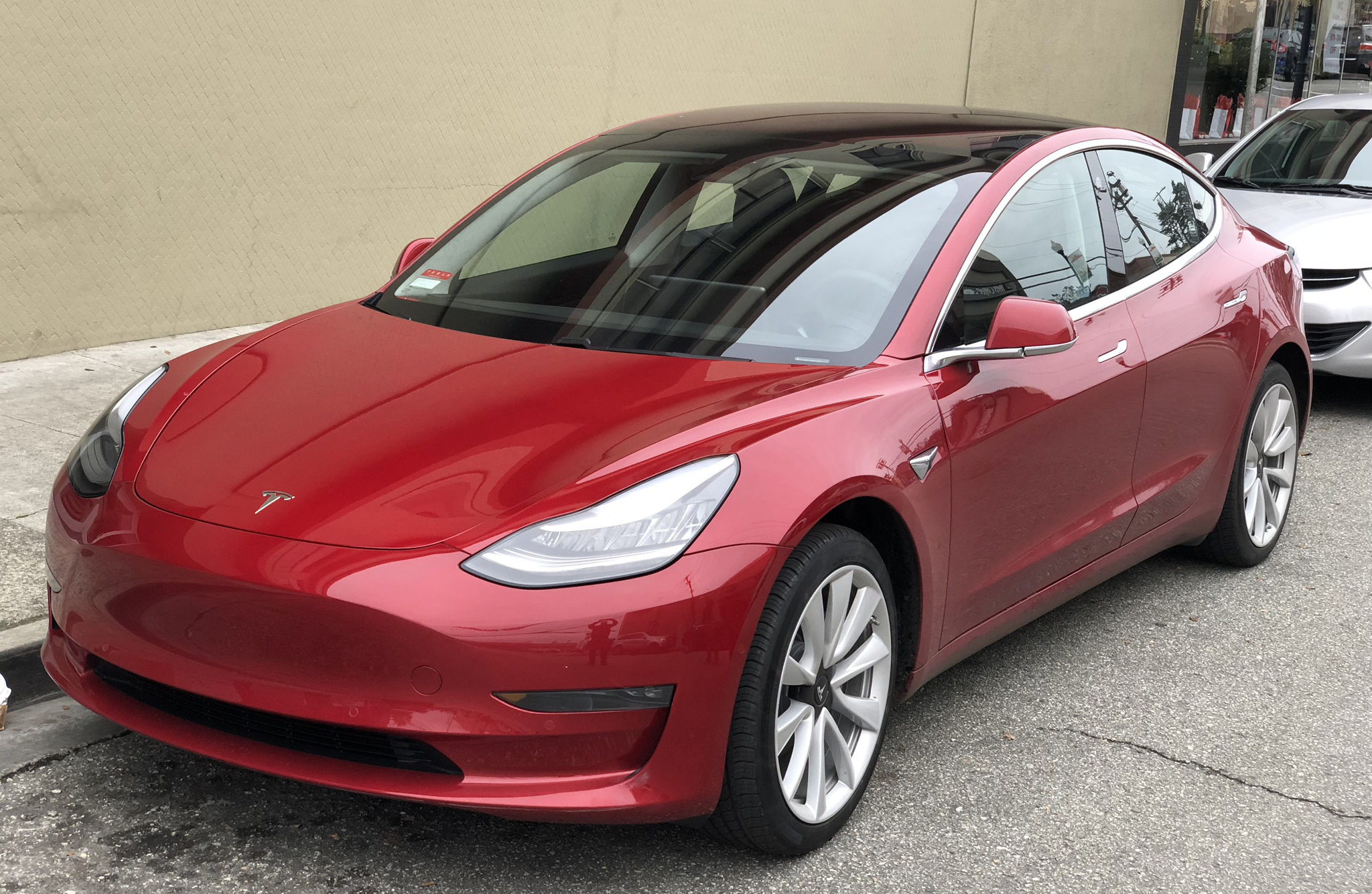 tesla_model_3_parked_front_driver_side