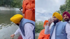 indický politik pije vodu z rieky