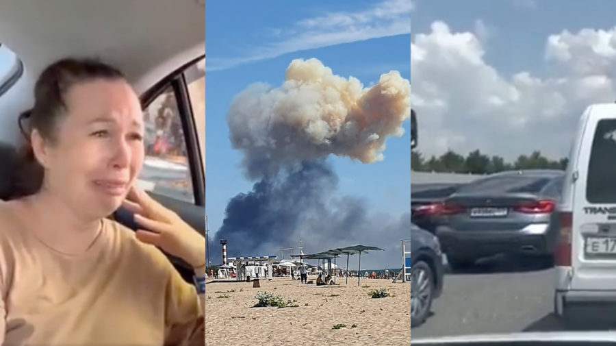 Nešťastná žena z Ruska sedí a narieka v aute pri úteku z Krymu, ktorým otriasli výbuchy na vojenskej základni. Výbuch vytvoril mrak dymu. Na diaľnici sa tvoria veľká kolóny