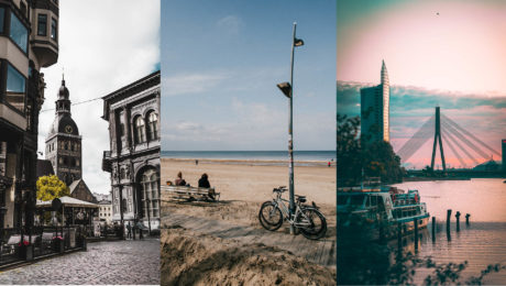 Stará Riga, ľudia na lavičke a bicykel na pláži, Riga loď na vode mrakodrapy v pozadí