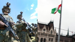 Na obázku sú vojaci a maďarská vlajka