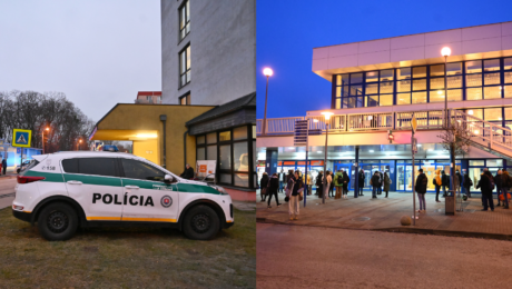 Policajné auto a ľudia pred trnavskou železničnou stanicou