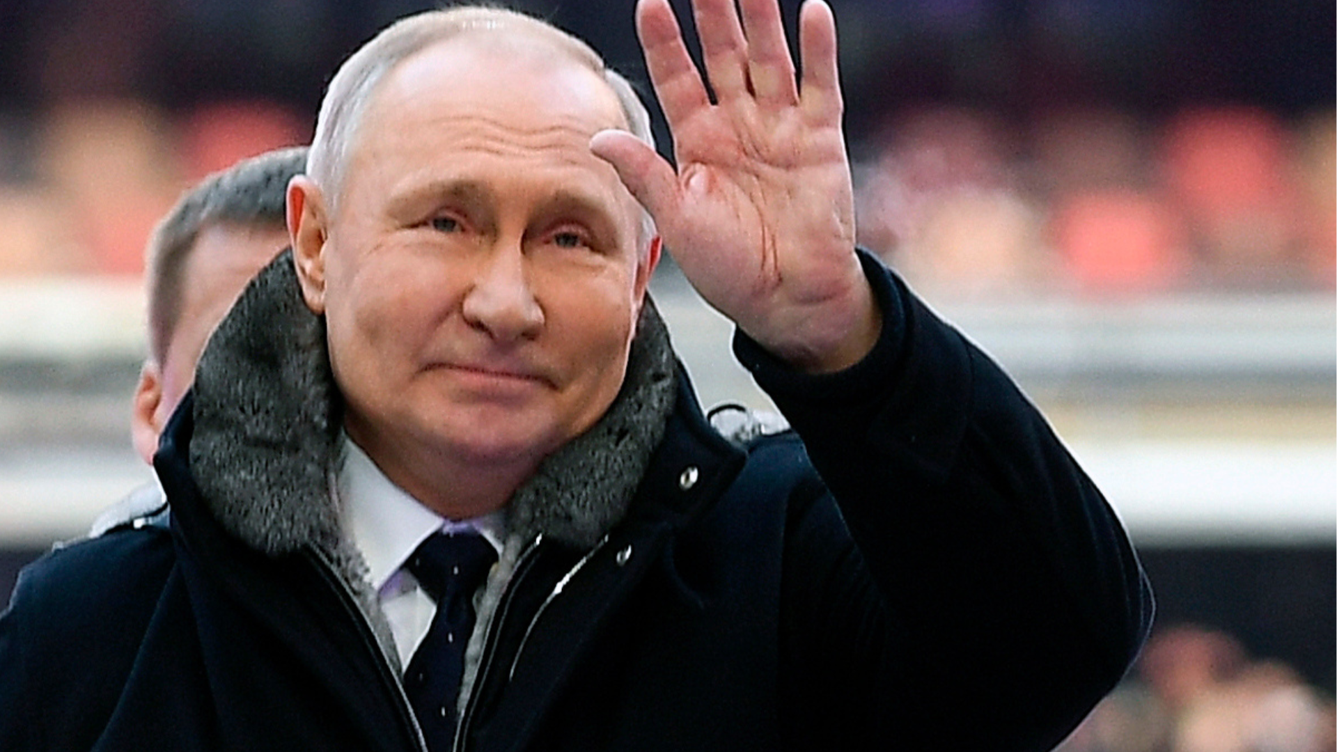 Vladimir Putin kýva