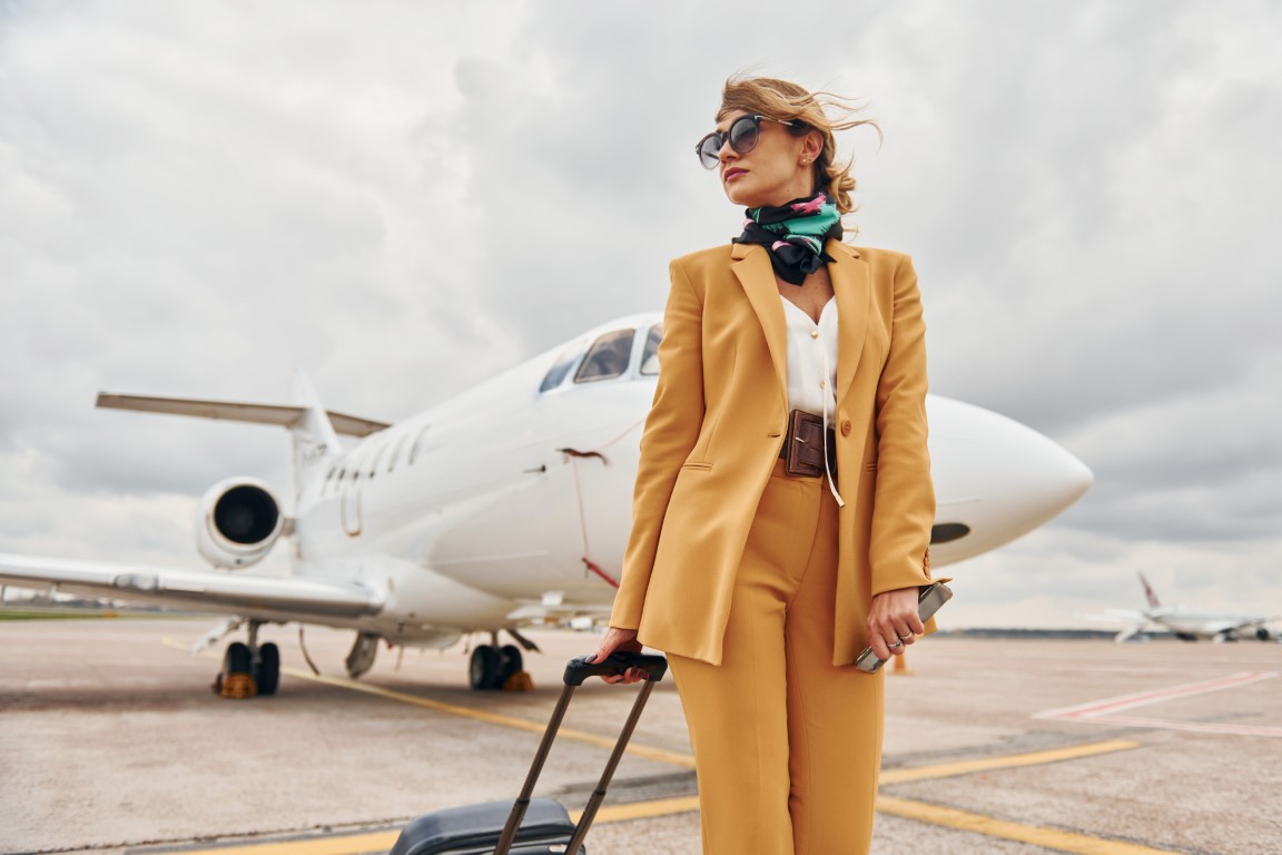 passenger-woman-that-is-in-yellow-clothes-sunglas-2022-01-18-23-40-50-utc