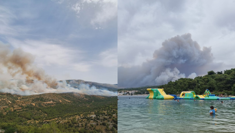 Pohľad na požiar a dym za kopcami