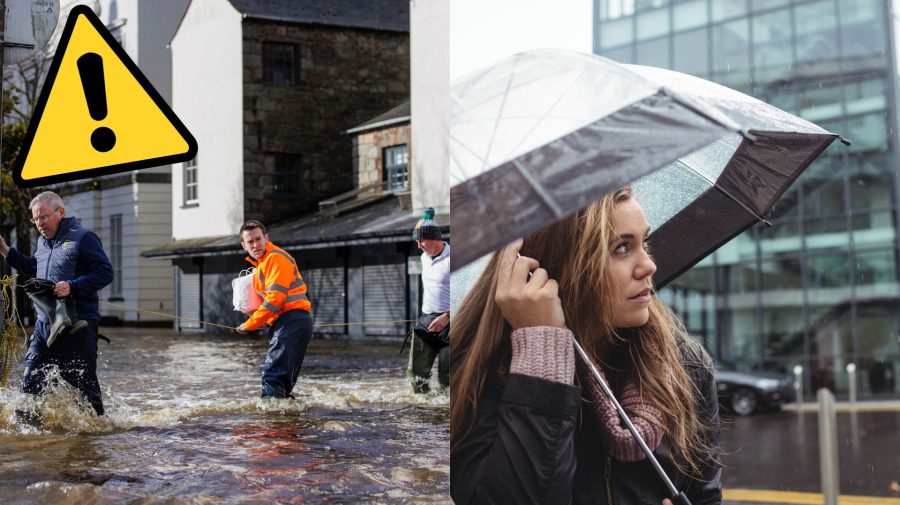 Muži sa snažia dostať cez zaplavenú ulicu a žena pozerá nad seba ukrytá pod dáždnikom.