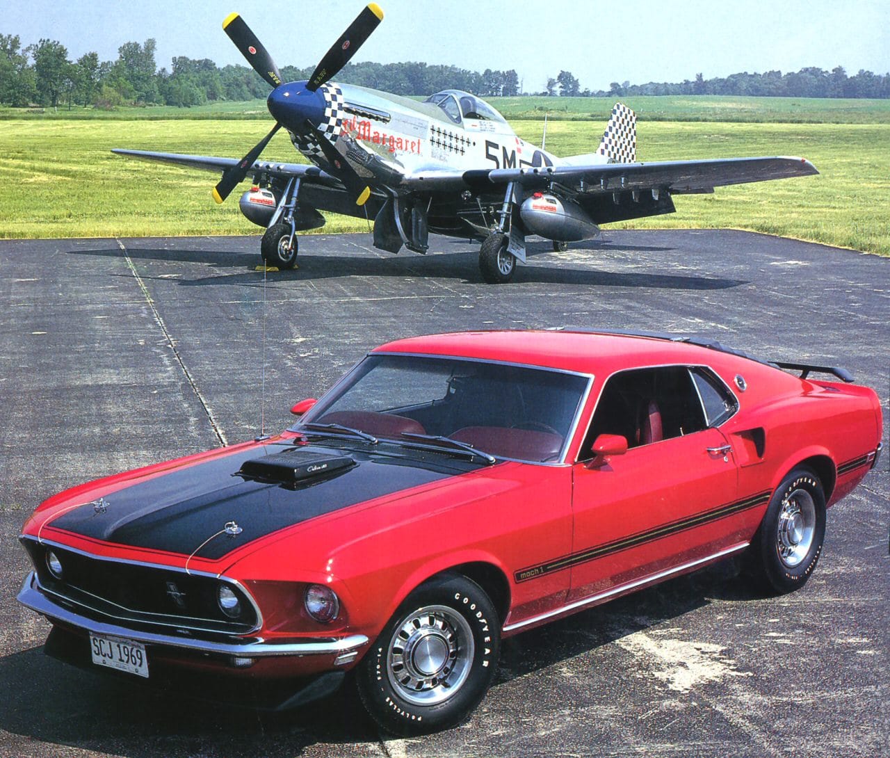 1969_Ford_Mustang_Mach_1_SportsRoof_428_Cobra_Je_t_w_P_51_Mustang_Fighter_Red_Frt_Qtr