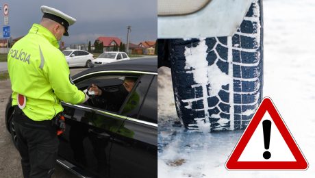 Policajt kontroluje doklady vodiča v aute a pneumatika, na ktorej je sneh.