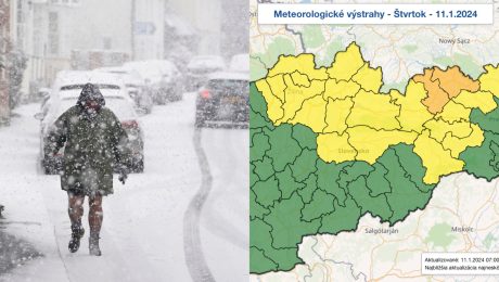 Na snímke muž kráča počas snehovej nádielky