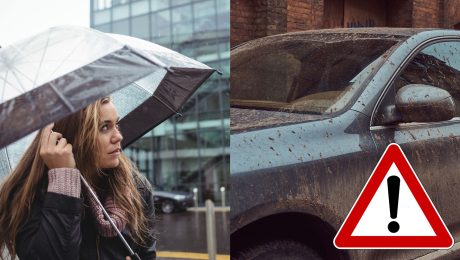Žena s dáždnikom v ruke a špinavé auto.