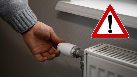 Ruka, ktorá pridáva teplotu na radiátory.