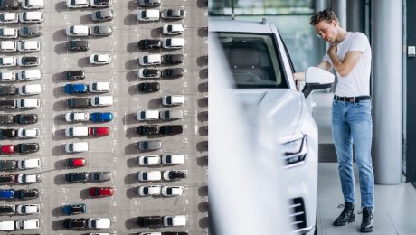 Autá na parkovisku a muž si obzerá vozidlo.