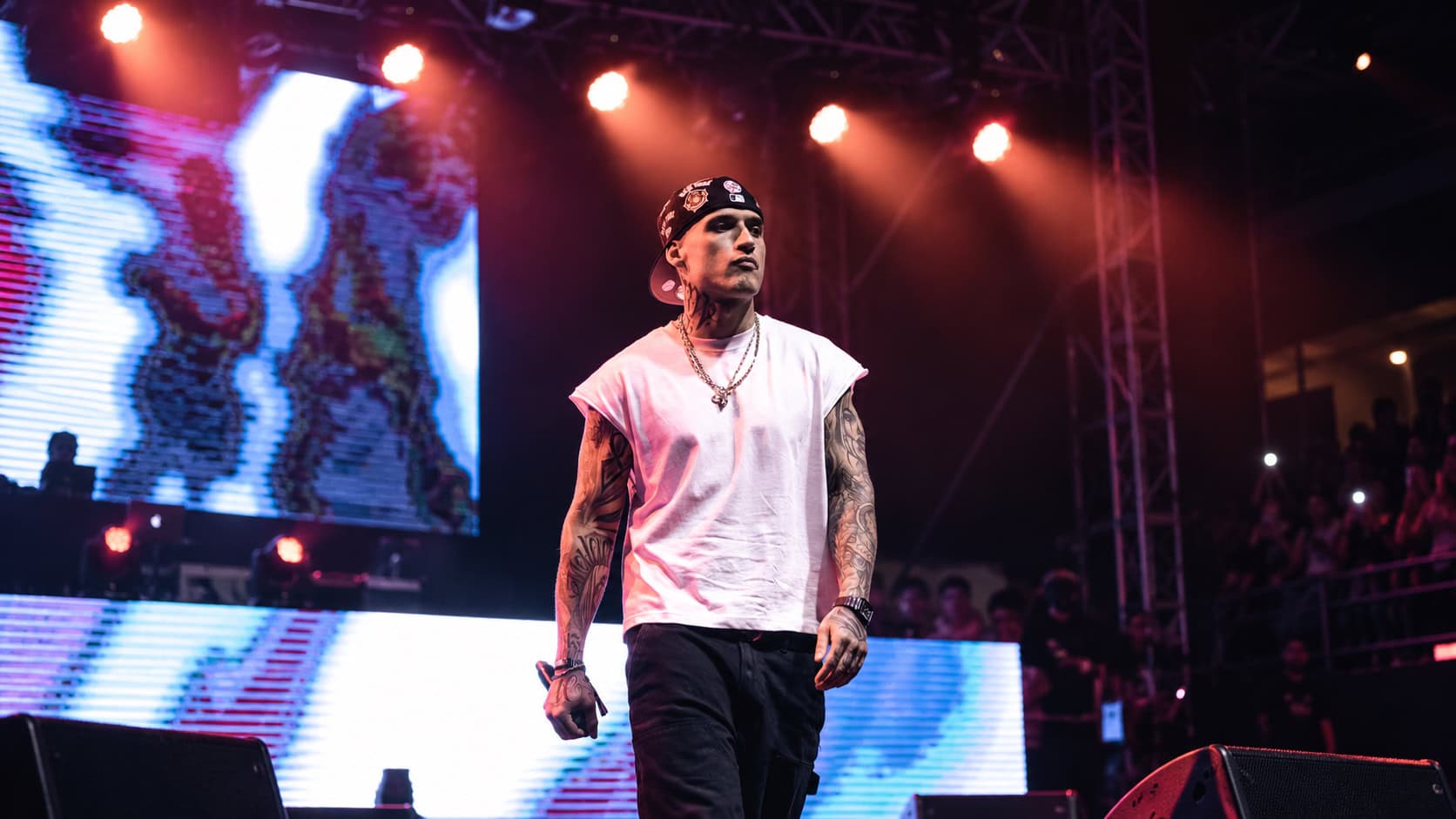 Tattooed Rapper Under Neon Lights